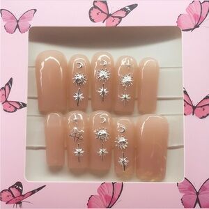 Nude Press-On Nails with Silver Star Accents